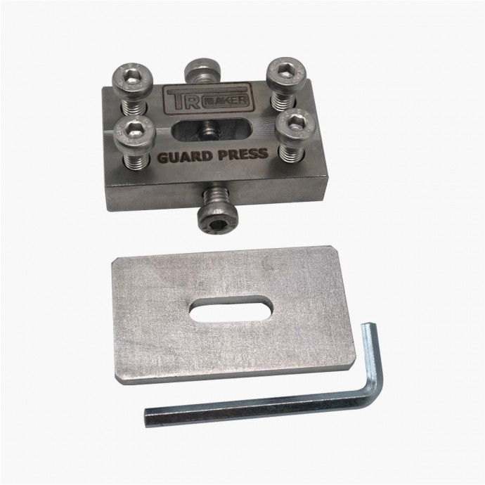 Manual press for guard mounting